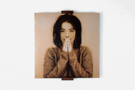 Now Playing — Wall Mounted 12" Record Holder - Bjork record in Walnut. Designed and made by Hey, Porter.