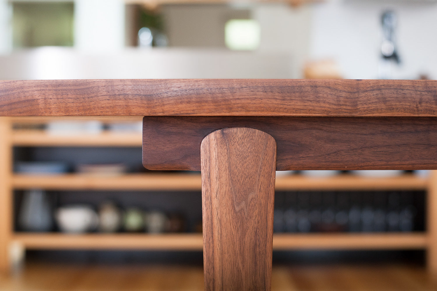 Wesley Dining Table in Walnut - detailed view of leg joinery. Designed and made by Hey, Porter.