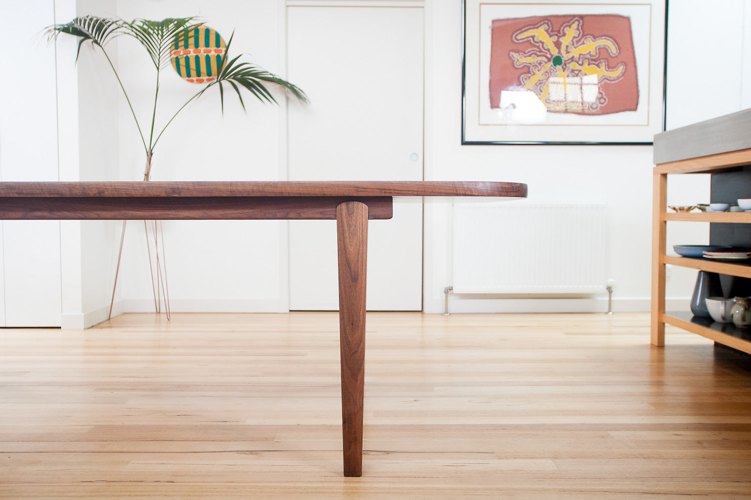 Wesley Dining Table in Walnut - front view. Designed and made by Hey, Porter.