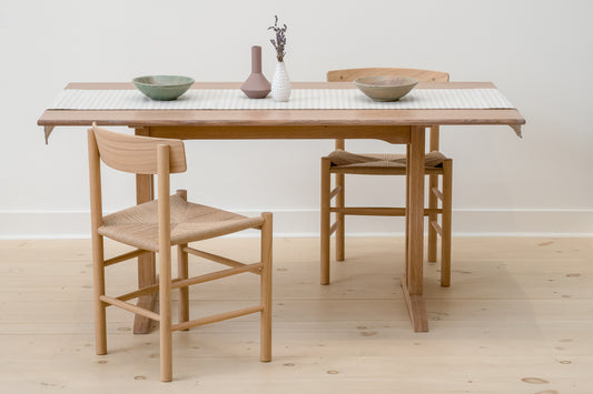 Knox Dining Table in White Oak with J39 Chairs - front view. Designed and made by Hey, Porter.